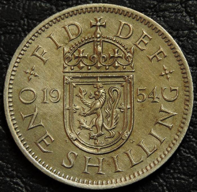 1 шиллинг 1954 Великобритания. 1 лев. Монета продается в единственном экземпляре, изображенном на фото.